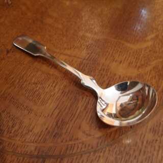Small ladle in a spade pattern in silver from the Art Deco around 1925