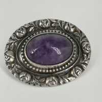 Antique Art Nouveau brooch in silver with roses and a large amethyst cabochon