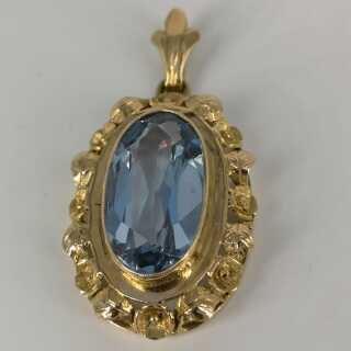 Large pendant in gold with a blue topaz from the 1950s