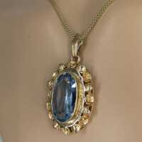 Large pendant in gold with a blue topaz from the 1950s