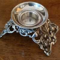 Small candle holder in silver for festive occasions