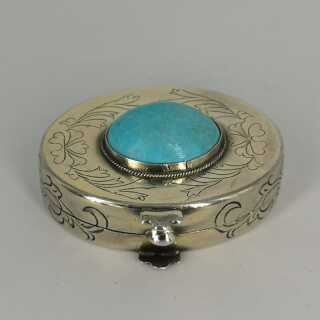 Beautiful oval vintage pill box in silver set with a turquoise
