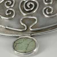 Beautiful oval brooch in silver with a turquoise abstract design