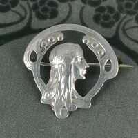 Art Nouveau brooch in silver with a womans relief