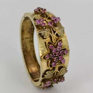 Antique ladies bangle in gold-plated silver with rich decor and rubies