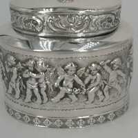 Enchanting Art Nouveau tea tin in silver with putti
