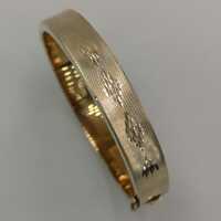 Wide bracelet in solid 333 / - yellow gold with a diamond...