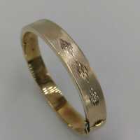 Wide bracelet in solid 333 / - yellow gold with a diamond...