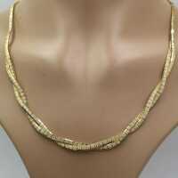 Elegant necklace in gold with square elements from the 1970s