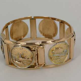 Armband mit verschiedenen astrologischen Zeichen in Gold und Platin 
