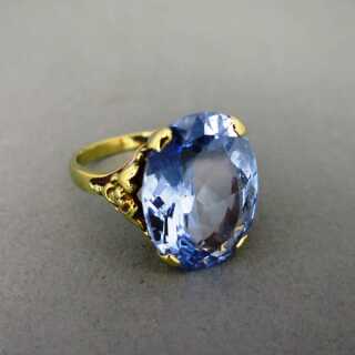 Beautiful gold ring with huge blue topaz