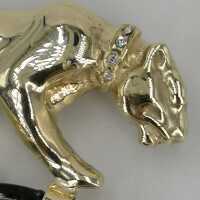 Panther brooch in gold with onyx ring and diamonds