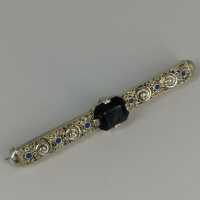 Enamelled Art Nouveau bar brooch with a tourmaline in 835...