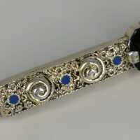 Enamelled Art Nouveau bar brooch with a tourmaline in 835 / - silver