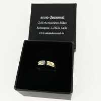Ladies band ring with diamonds in two-tone gold geometric design