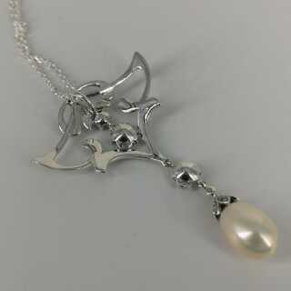 Large art nouveau pendant in silver with topaz and pearl