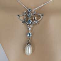 Large art nouveau pendant in silver with topaz and pearl