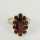 Ladies ring in gold from the 1950s with a rosette made of garnet stones