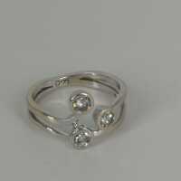 Delicate ladies ring in 18 k white gold with three beautiful diamonds