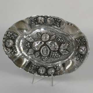 Oval silver bowl with pomegranate decoration in repousse technique