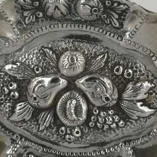 Oval silver bowl with pomegranate decoration in repousse technique