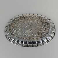 Small oval silver bowl with bird decor in repousse technique