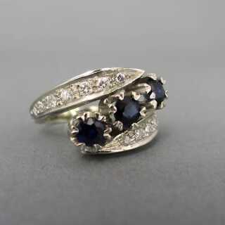 White gold ring with sapphire and diamonds