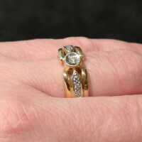 Two-tone band ring with diamonds in yellow and white gold