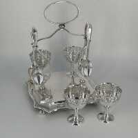 Set with 4 egg cups with holder and 4 teaspoons around 1920