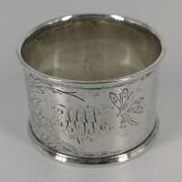 Art Nouveau napkin ring in silver with flower and...