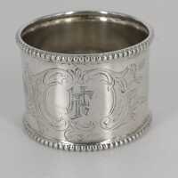 Art Nouveau napkin ring in silver with rocailles decor and monogram