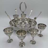 Set with 6 egg cups with holder and 6 teaspoons around 1910