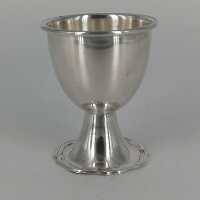 Simple egg cup in silver with a wavy edge around 1920...