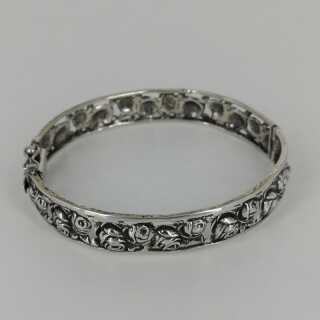 Antique silver bangle with openwork rose decor