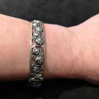 Antique silver bangle with openwork rose decor