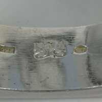 Modernist bangle in abstract form in solid silver
