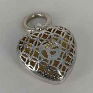Modern solid openwork silver charm in heart shape