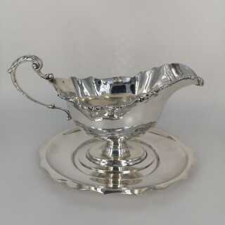 Sauce boat with matching tray in solid sterling silver from England