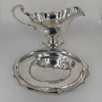 Sauce boat with matching tray in solid sterling silver...