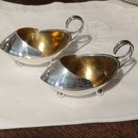 Pair of butter or fish sauce casters in solid silver from 1910