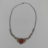 Beautiful costume jewelry necklace in silver with coral cabochon