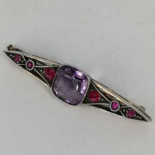 Antique brooch in silver with amethyst and rubies