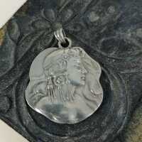 Art Nouveau Pendant in Silver with Relief of a Woman around 1900