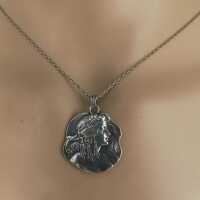 Art Nouveau Pendant in Silver with Relief of a Woman around 1900