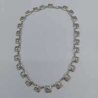 Elegant necklace in silver with meander modern design...