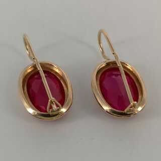 Beautiful gold earrings with red spinels from Russia