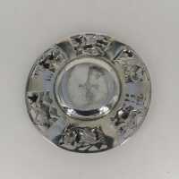 Openwork small art nouveau plate in silver and amber