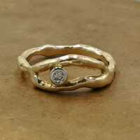Handmade engagement ring in gold with diamond