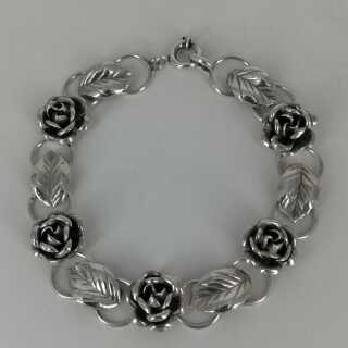 Pretty bracelet with rose decoration in solid silver