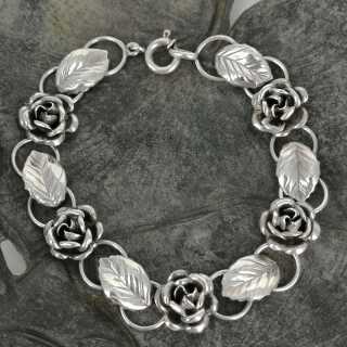 Pretty bracelet with rose decoration in solid silver